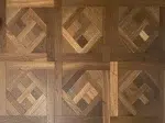 parquet de versailles teinte brune